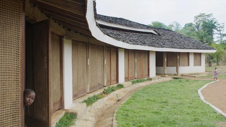 Photo of Ilima Primary School, View of the concave wall and custom screened doorways